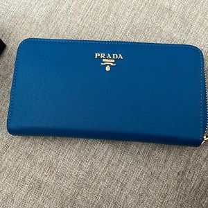 Brand new blue Prada zip around wallet